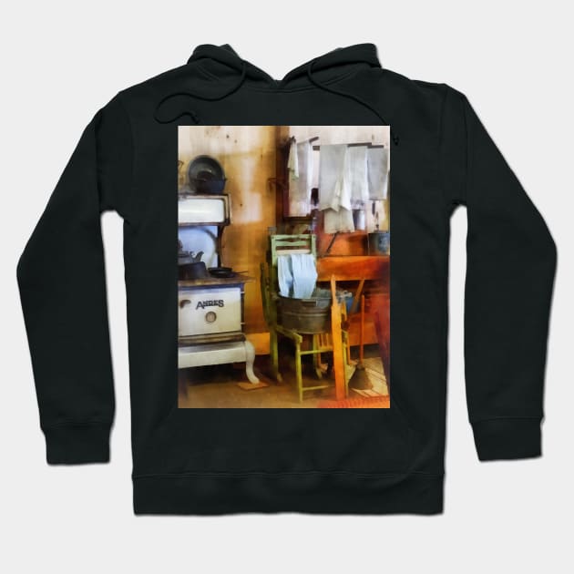 Housekeepers - Laundry Drying in Kitchen Hoodie by SusanSavad